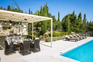 The swimming pool at or close to Aloni Villa - Contemporary Villa with Private Pool & Sea Views, Fiskardo