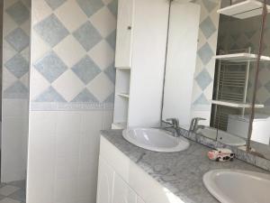 Koupelna v ubytování Appartement à la mer