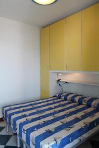 Postel nebo postele na pokoji v ubytování Complesso Solarium