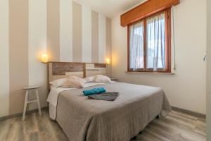 Postel nebo postele na pokoji v ubytování Hotel Albatros