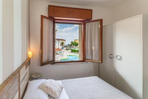 Postel nebo postele na pokoji v ubytování Hotel Albatros