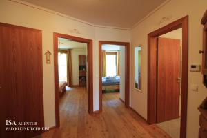 A bed or beds in a room at Ski-to-door DORFBLICK Diamant Apartment