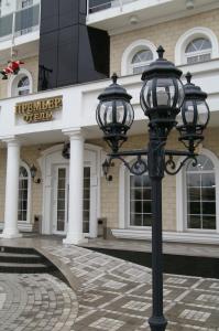 a street light in front of a building at Premier Hotel in Krasnodar
