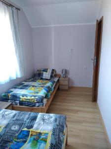 Postel nebo postele na pokoji v ubytování Fortuna