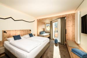 Posteľ alebo postele v izbe v ubytovaní Dips&Drops - First Bike & Ski Hub