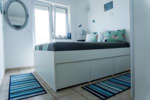 Postel nebo postele na pokoji v ubytování Apartman ZTC