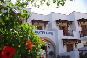 a hotel building with a sign that reads hotel elite at Effie Hotel in Skala