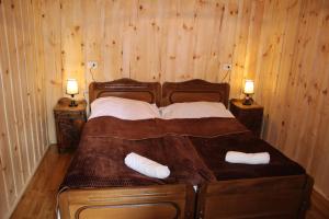 Voodi või voodid majutusasutuse Ecohouse Svaneti toas