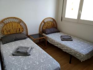 Postel nebo postele na pokoji v ubytování Cunit Playa