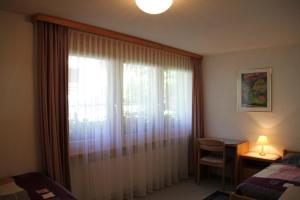 Postel nebo postele na pokoji v ubytování Haus Pan