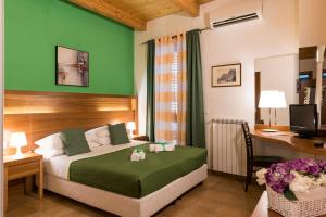 Postel nebo postele na pokoji v ubytování Murat Guesthouse