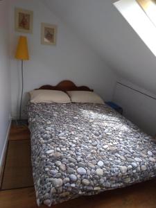 Postel nebo postele na pokoji v ubytování Ma Maison De Poupée