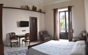Postel nebo postele na pokoji v ubytování BnB Agorà Panoramic Rooms + 37 fotografií