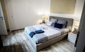 Tempat tidur dalam kamar di Villa Elena B&B experience