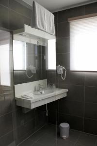 Koupelna v ubytování Hotel Otus