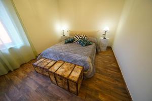 Postel nebo postele na pokoji v ubytování APPARTAMENTO DA DAVID