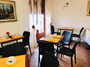 Restaurant ou autre lieu de restauration dans l'établissement Villa Regina