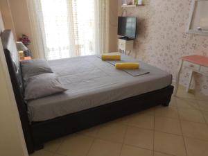 Postel nebo postele na pokoji v ubytování Brick Apartment