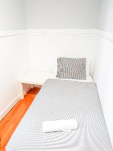 Posteľ alebo postele v izbe v ubytovaní Pension Aussie Guesthouse