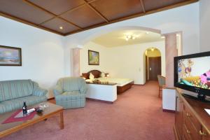 TV o dispositivi per l'intrattenimento presso Hotel Residenz Hochland