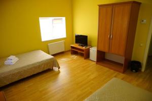 Postel nebo postele na pokoji v ubytování Hotel Nova