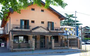 an old building on the corner of a street at Hotel Casanova in Padova