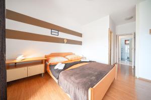 Posteľ alebo postele v izbe v ubytovaní Apartments Janjac