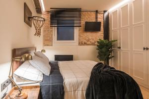 Postel nebo postele na pokoji v ubytování Miribilla by Staynnapartments