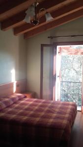 Postel nebo postele na pokoji v ubytování agriturismo AI COLORI