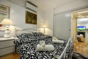 Postel nebo postele na pokoji v ubytování Apartment Markovski