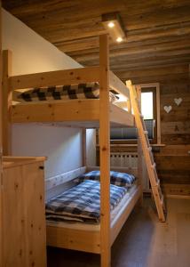 Postel nebo postele na pokoji v ubytování Chalet Gletscherblick Stubai
