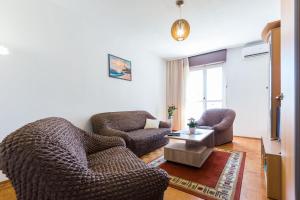 Posezení v ubytování Nina Apartment