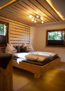 Postel nebo postele na pokoji v ubytování Chalet Gletscherblick Stubai