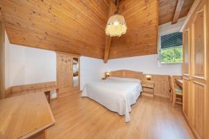 Postel nebo postele na pokoji v ubytování Hotel Karinhall