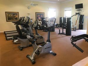 a gym with several exercise bikes in a room at Serenata Condominiums,Sarasota in Sarasota +6 photos