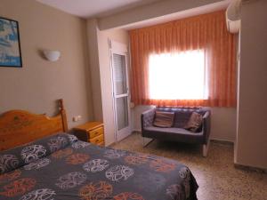 Postel nebo postele na pokoji v ubytování Hotel Alain