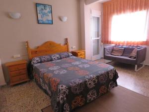 Postel nebo postele na pokoji v ubytování Hotel Alain