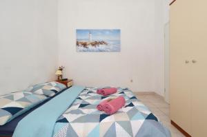 Postel nebo postele na pokoji v ubytování Apartment House Juretic - 50 m from the beach