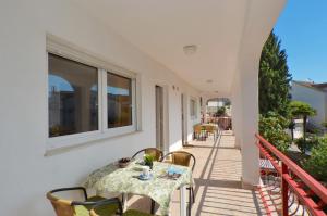 Balkón nebo terasa v ubytování Apartment House Juretic - 50 m from the beach