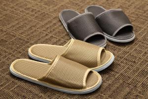 a pair of shoes sitting on the floor at Dormy Inn Premium Kyoto Ekimae Natural Hot Spring in Kyoto