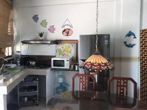 Una cocina o zona de cocina en San Andres Ultd Inn RNT # 30017