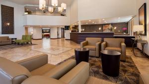 a lobby of a hotel with couches and chairs at Best Western Plus West Covina Inn in West Covina