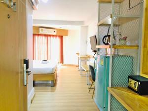 Kuchyň nebo kuchyňský kout v ubytování Ingnaam Hotel