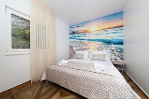 Posteľ alebo postele v izbe v ubytovaní REDSTONE luxury apartments