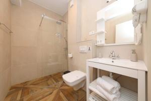 Koupelna v ubytování REDSTONE luxury apartments