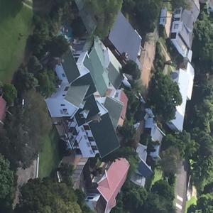 an aerial view of a house with many roofs at A White House Guest House in Grahamstown