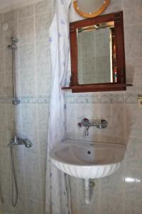 Ванная комната в Homeros Pension & Guesthouse