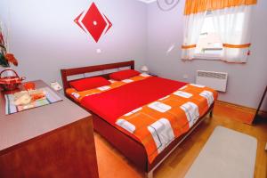 Postel nebo postele na pokoji v ubytování Apartments Saric