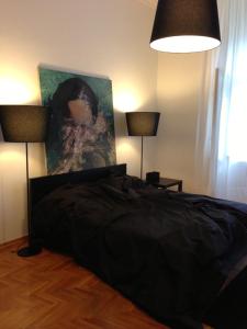 Łóżko lub łóżka w pokoju w obiekcie Valsabbion City Suite