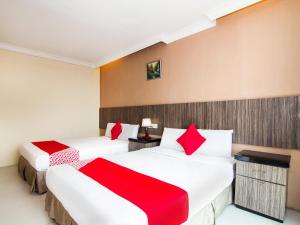 Cama o camas de una habitación en Crystal City Hotel
